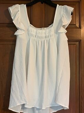 White Ruffled Sleeve Textured Blouse. Brand new size Medium